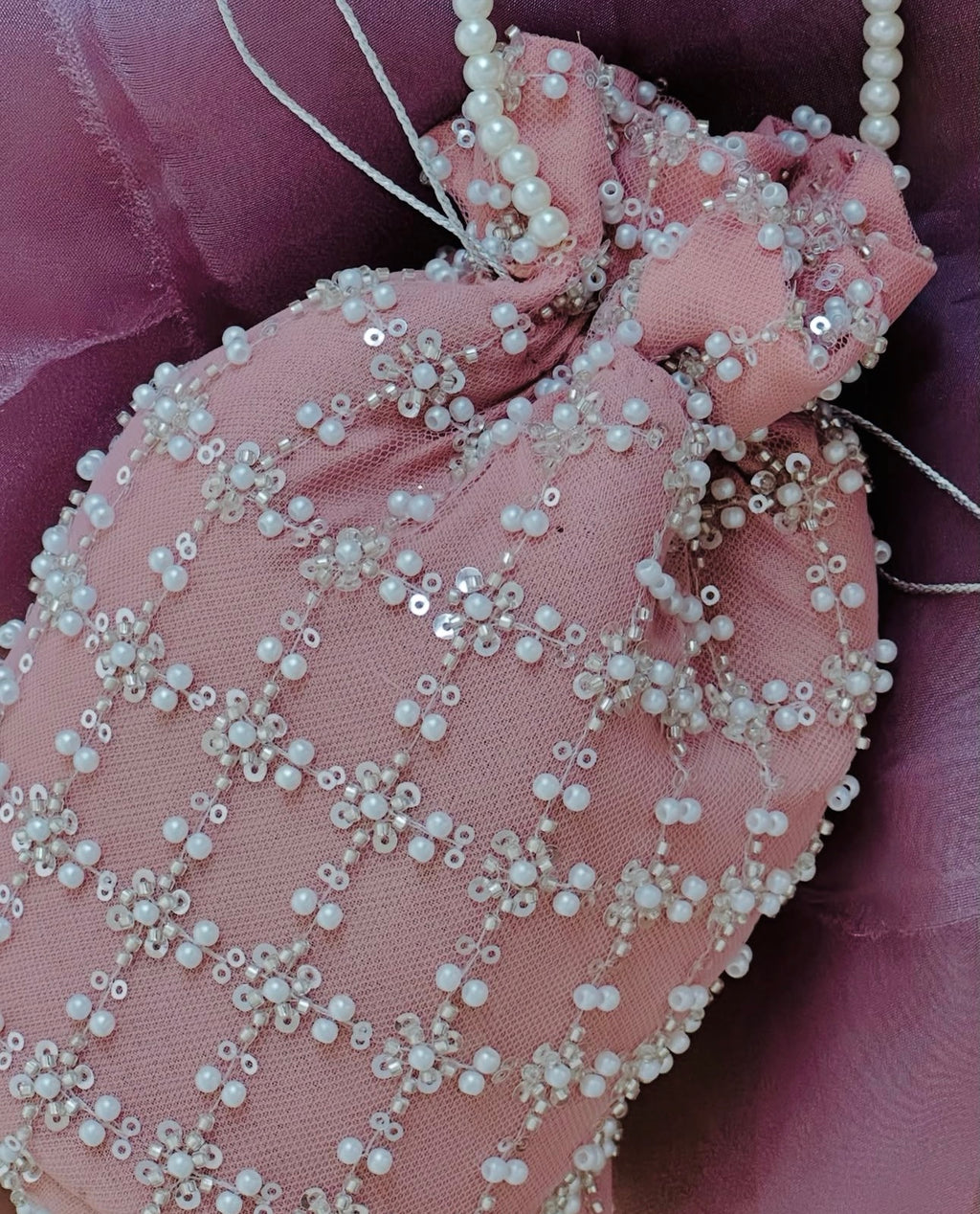 Shafaq: Pink Hand-Embroidered Pearl & Sequin Net Potli