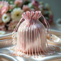 Afshaan Pink Silk Potli Bag with Hand-Strung Pearl Fringes