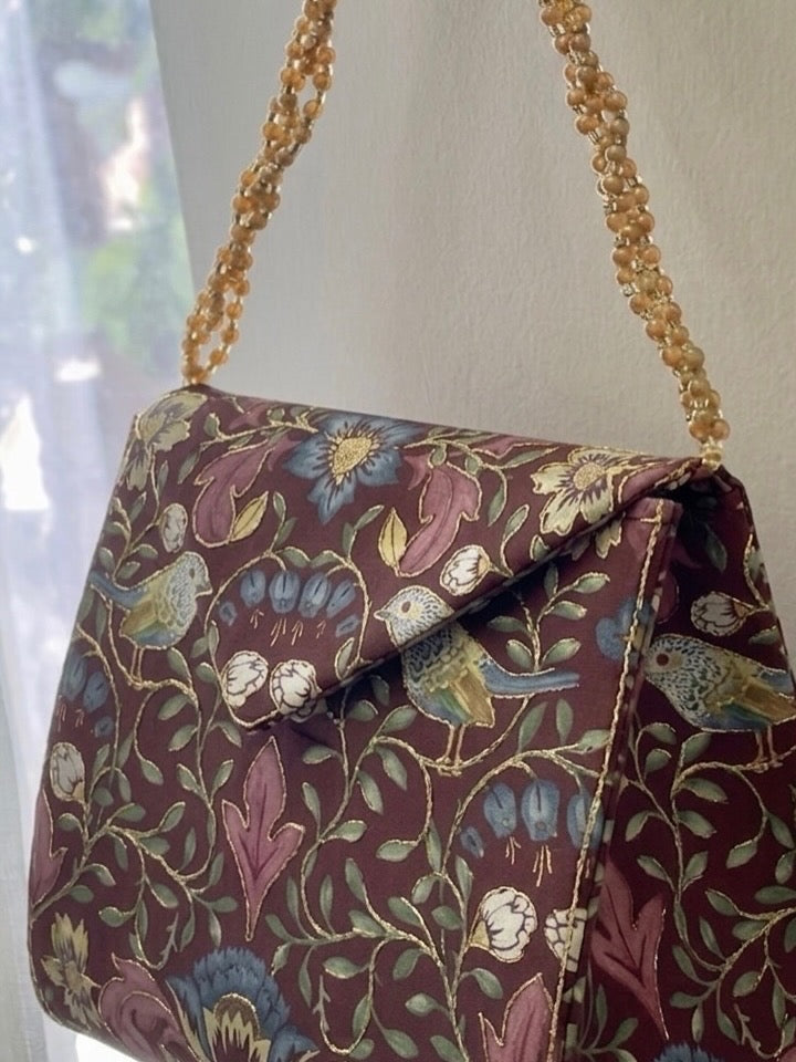 Gilded Nightingale: Maroon Bird Bag With Golden Outline