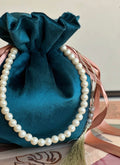 Tehzeeb: Teal Velvet Potli Bag with Satin Ribbon & Pearl Strap