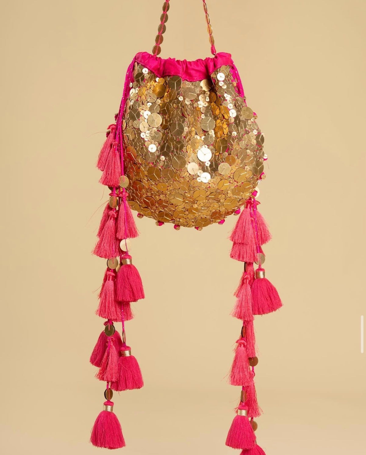 Noor Jahan Handcrafted Sequin Potli Bag with Tassels