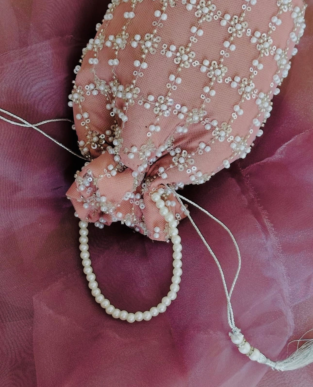 Shafaq: Pink Hand-Embroidered Pearl & Sequin Net Potli