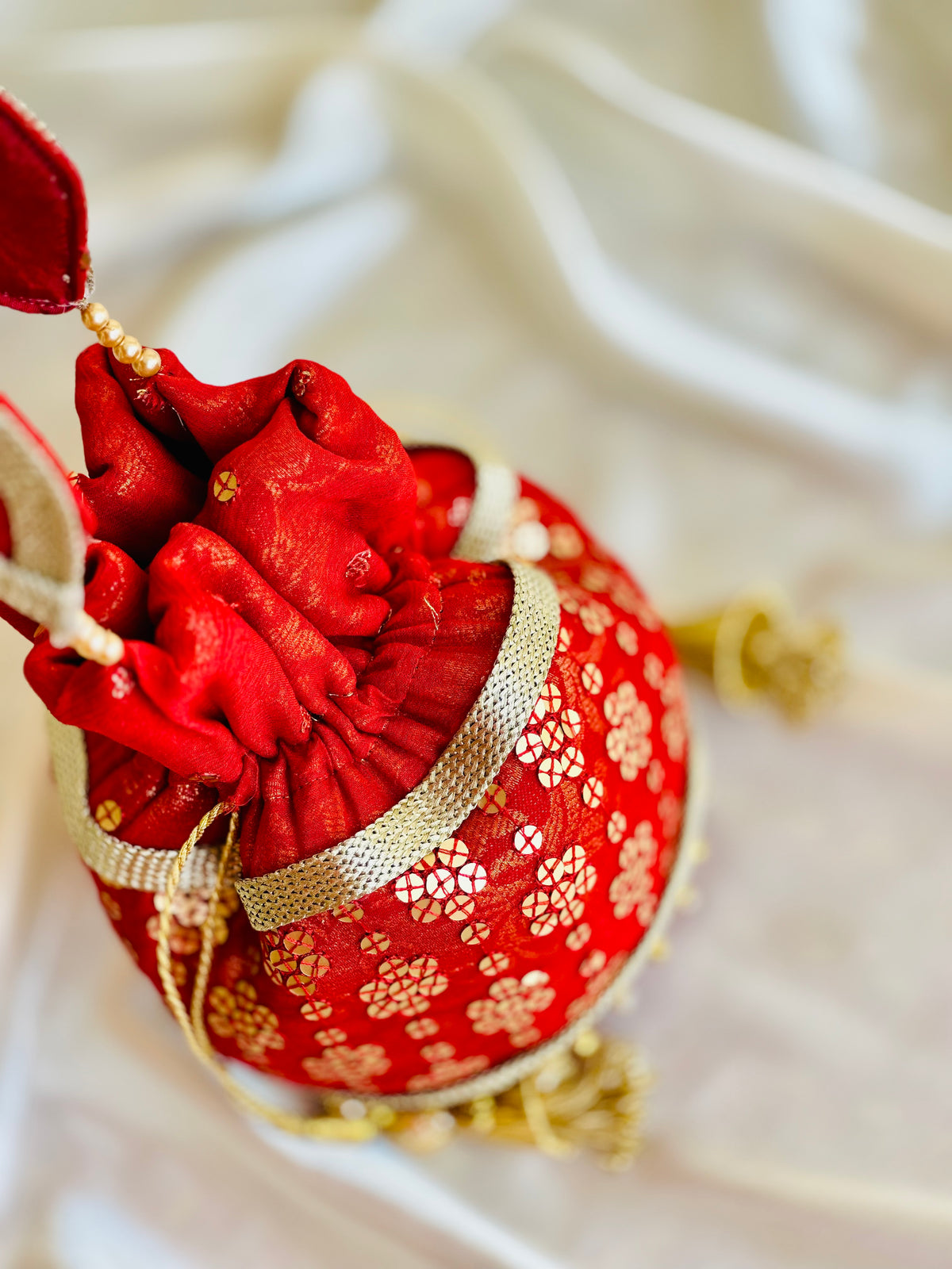 Marjaan Hand-Embellished Sequin Potli Bag with Golden Bead Accents – Radiant Red (Customizable)