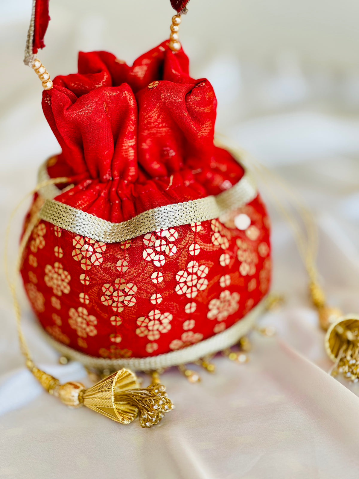 Marjaan Hand-Embellished Sequin Potli Bag with Golden Bead Accents – Radiant Red (Customizable)