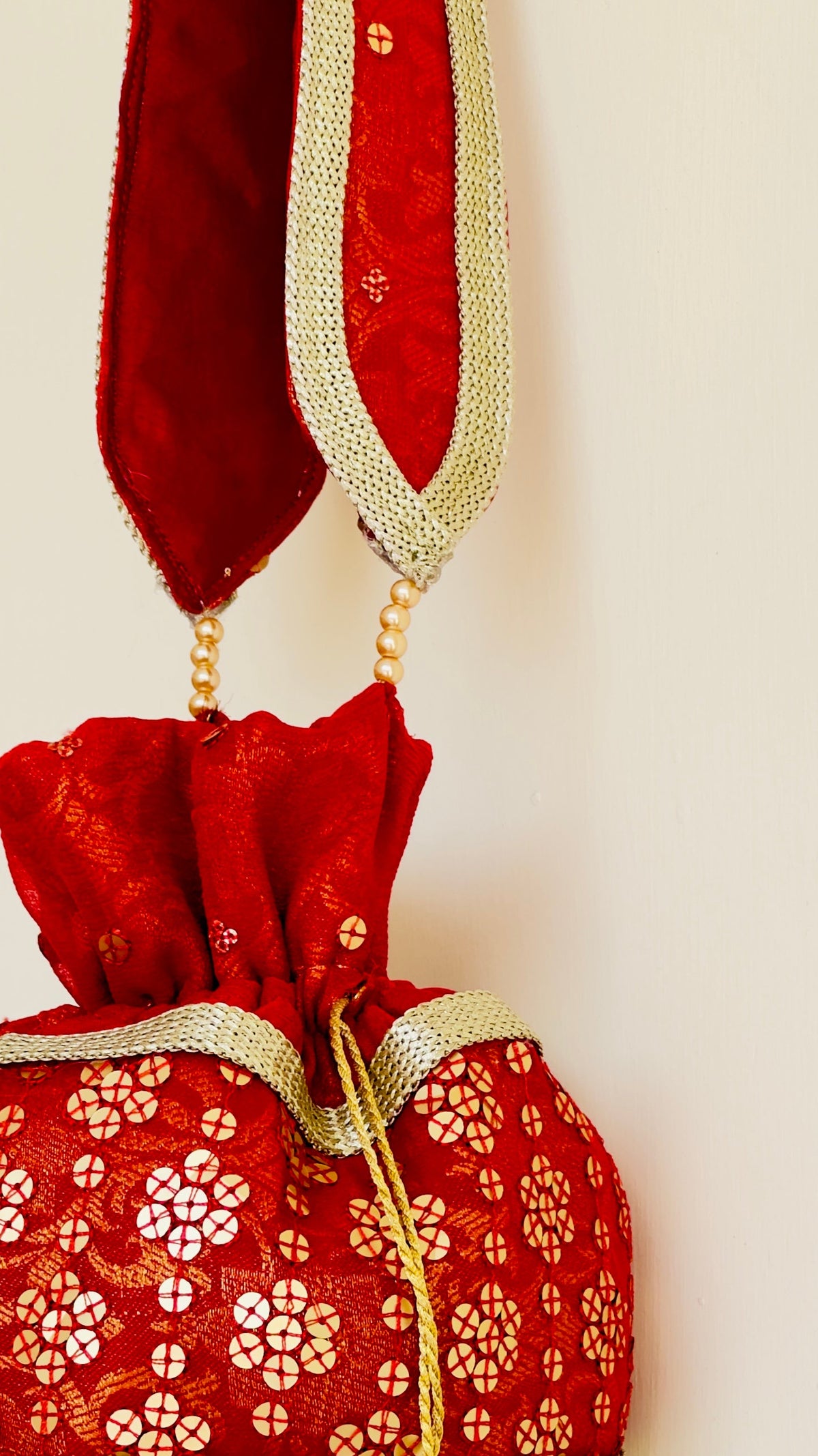Marjaan Hand-Embellished Sequin Potli Bag with Golden Bead Accents – Radiant Red (Customizable)
