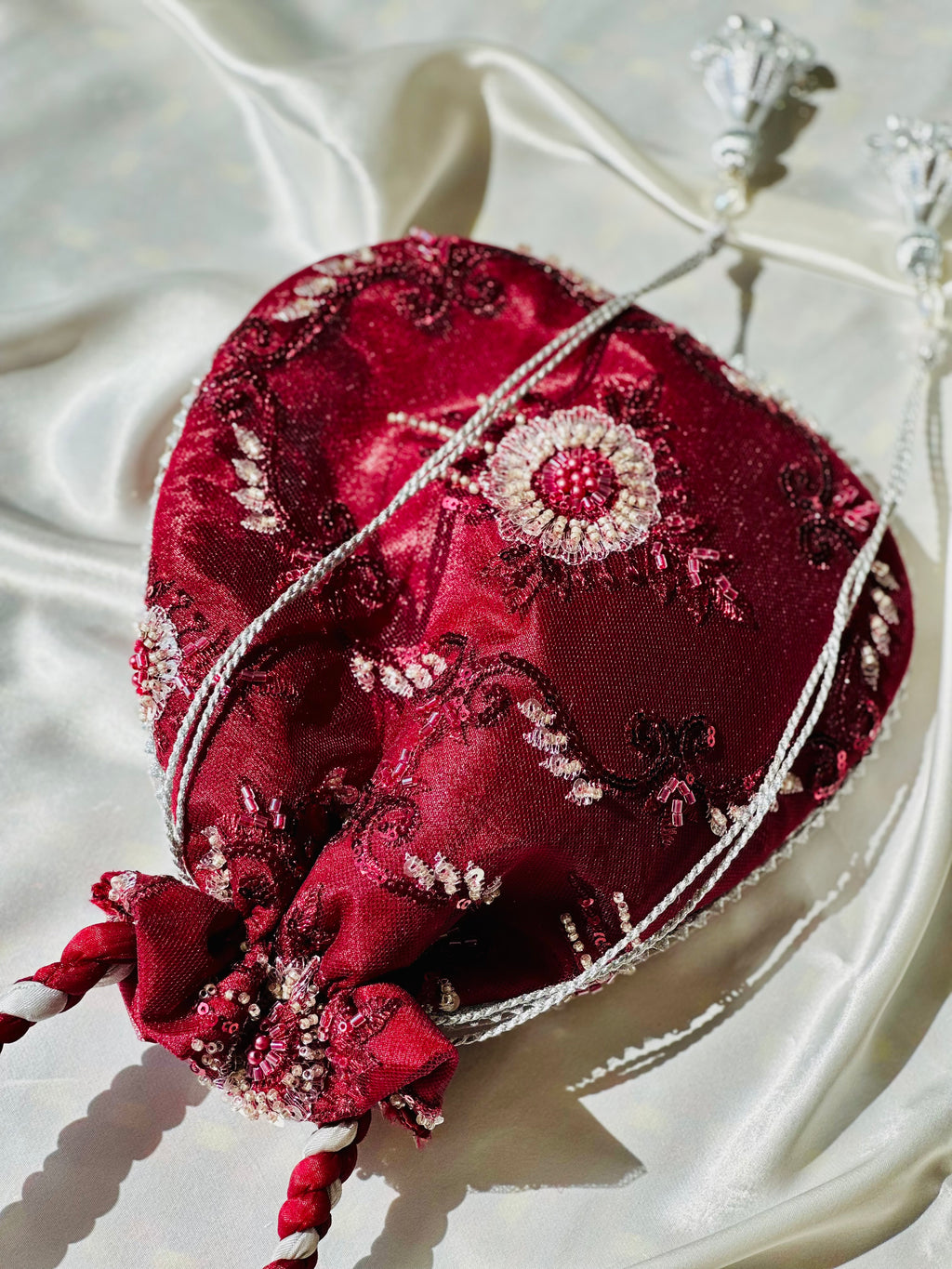 Zar-e-Shahi: Handmade Maroon and Silver Potli Bag