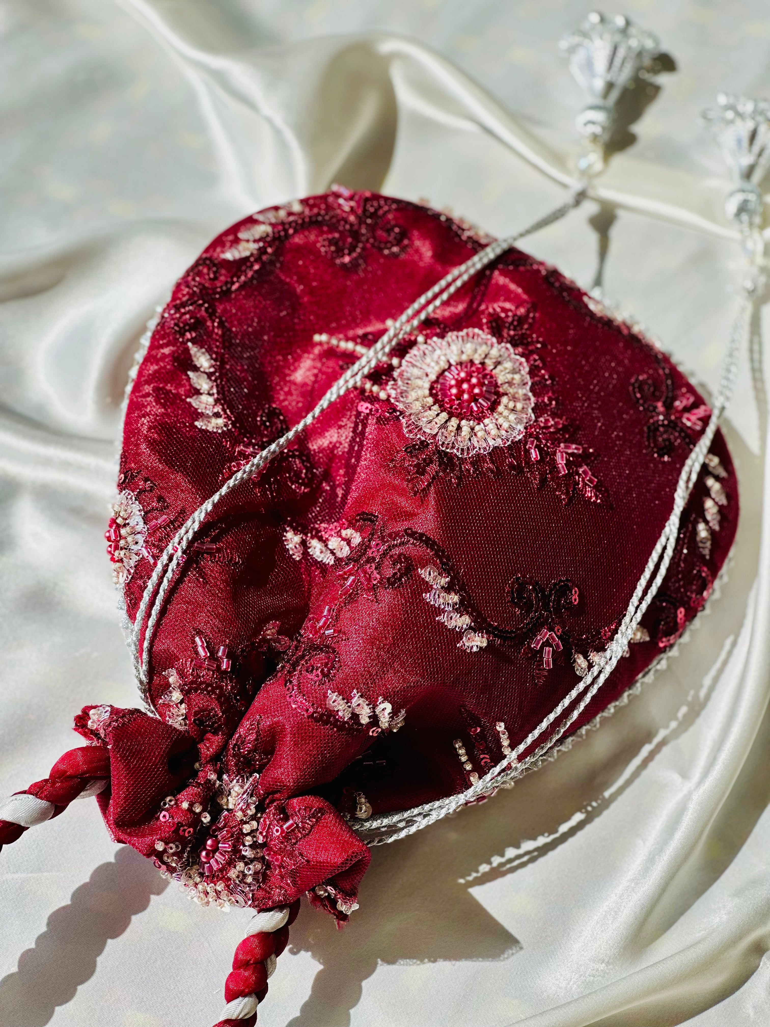 Zar-e-Shahi: Handmade Maroon and Silver Potli Bag