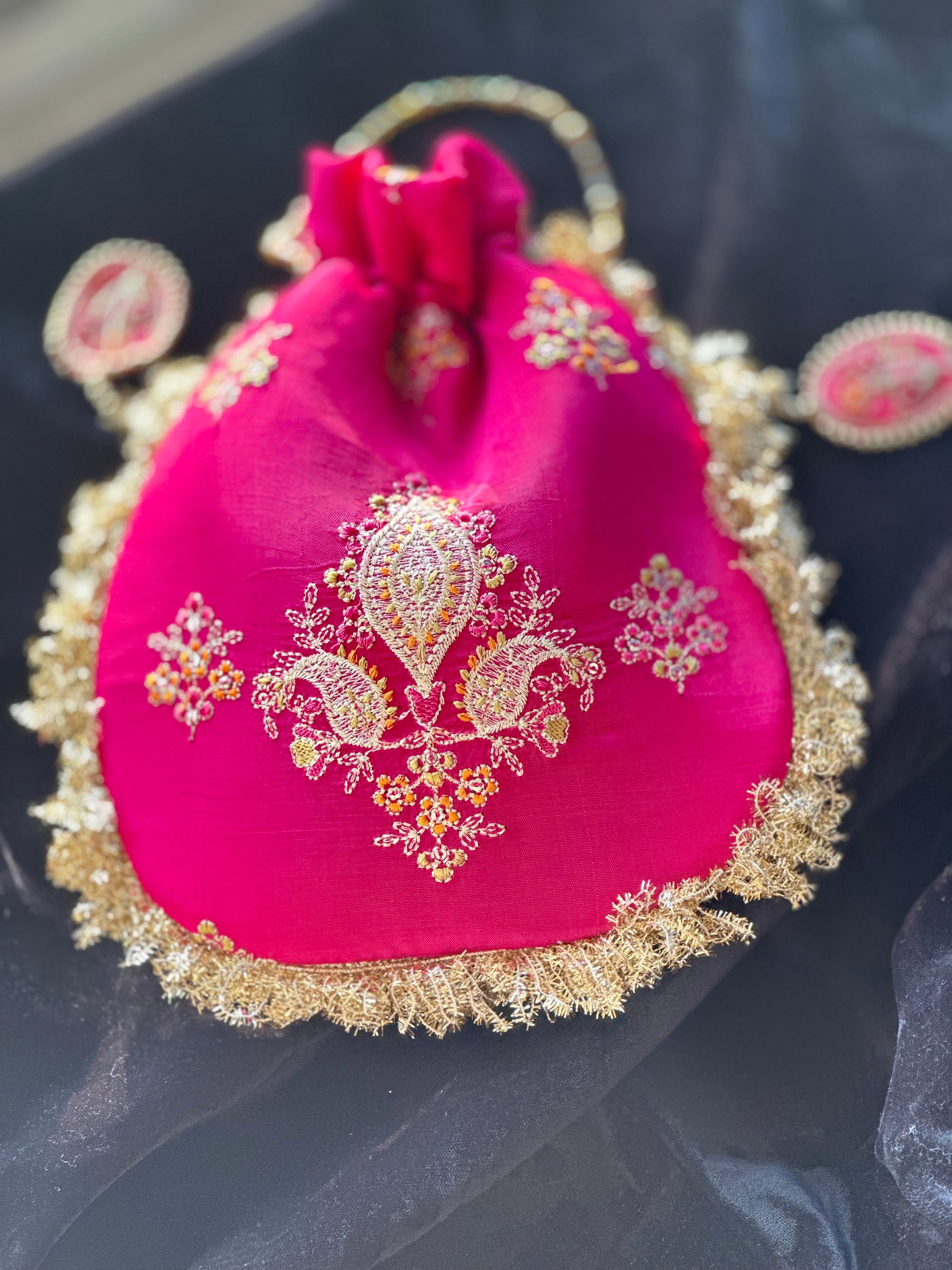 Rukhsaar: Hot Pink Silk Potli - Gold Motifs & Fringes