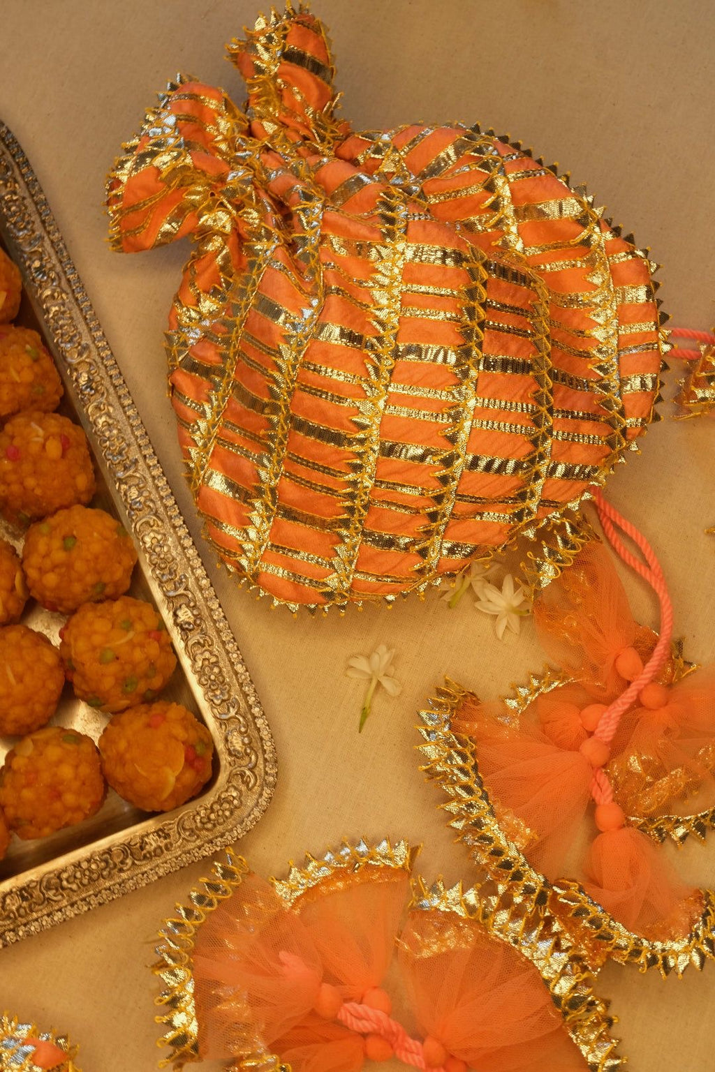 Zar Bano: Mustard Potli Bag with Traditional Gold Gota Work