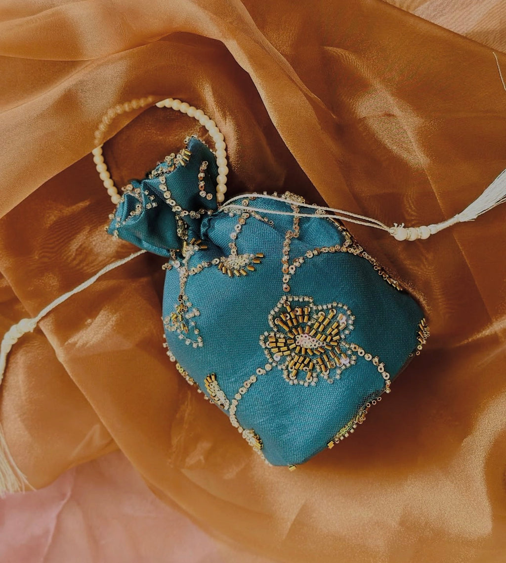 Roshan Aara: Teal Net Potli with Gold Cutdana Embroidery