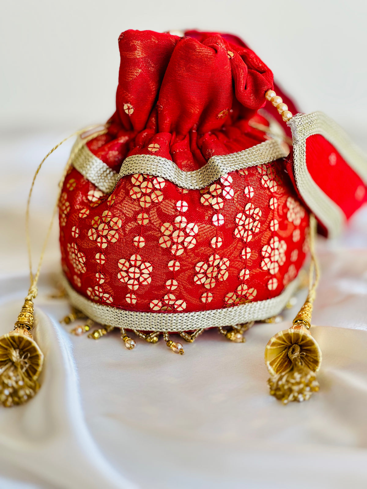 Marjaan Hand-Embellished Sequin Potli Bag with Golden Bead Accents – Radiant Red (Customizable)