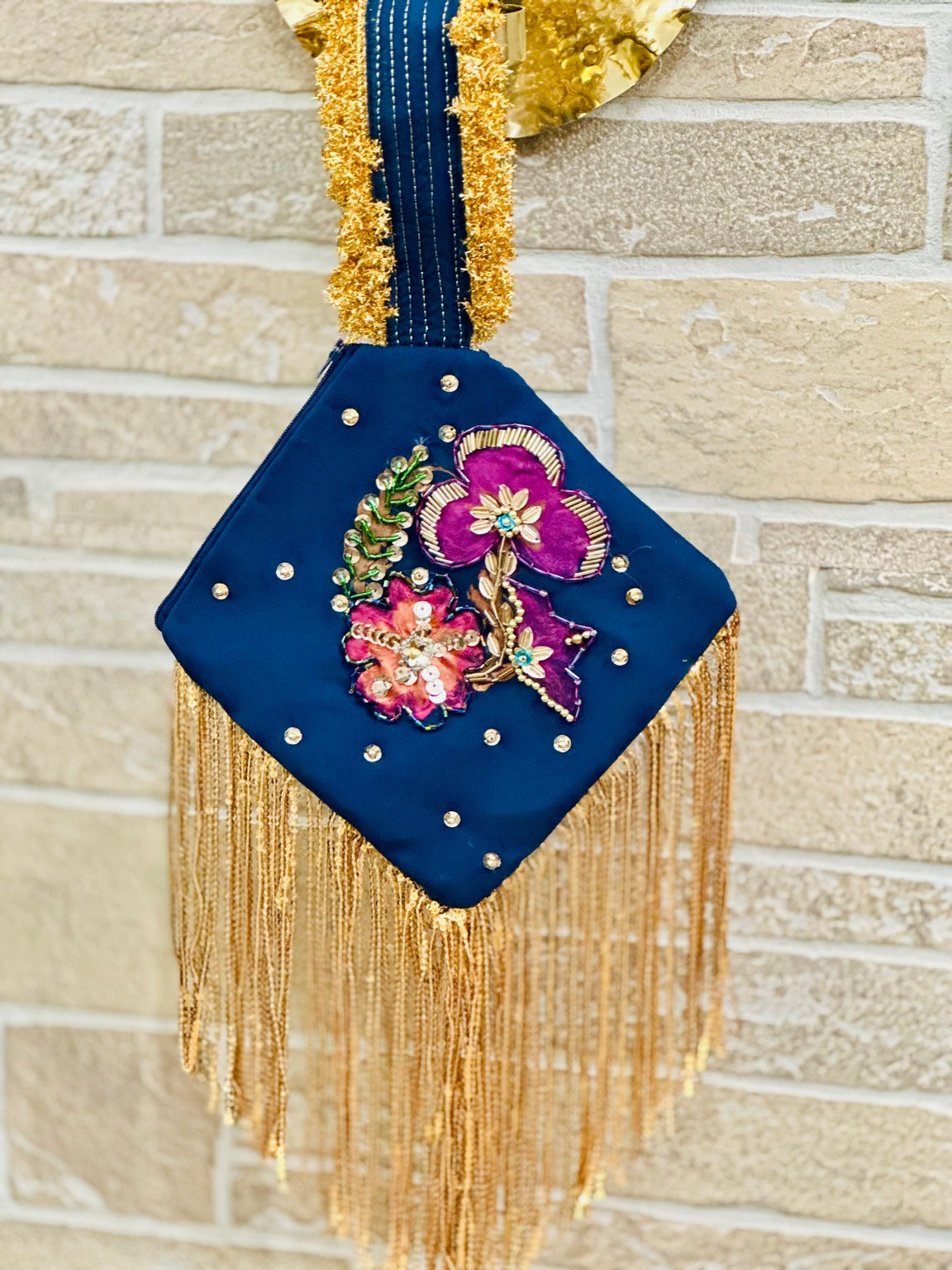 Gul-e-Zar Hand Painted & Embellished Floral Potli Bag with Golden Fringe
