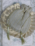 Nishat نشاط: Designer Gold Pleated Potli Bag with Pearl Tassels for Weddings