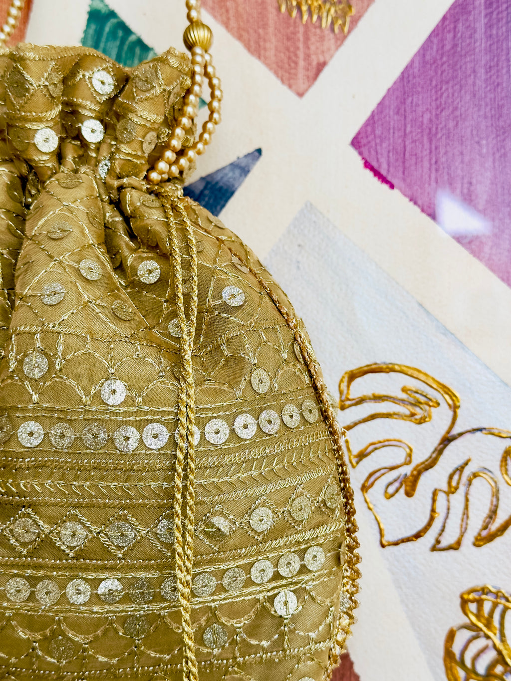 Zarnaab (زرناب): Golden Hand-Embellished Bridal Potli