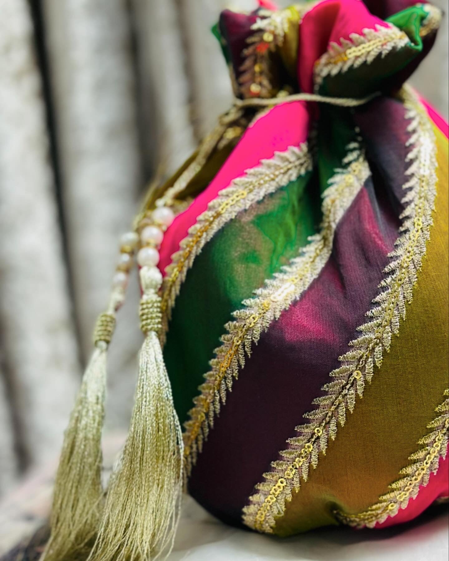 Ghazal — غزل | Multi-Colored Striped Chiffon Potli Bag with Gold Embroidery