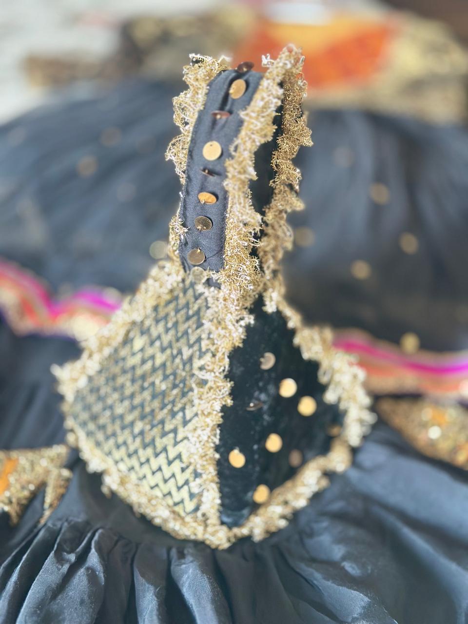 Surmai: Black & Gold Chevron Hand-Embellished Potli