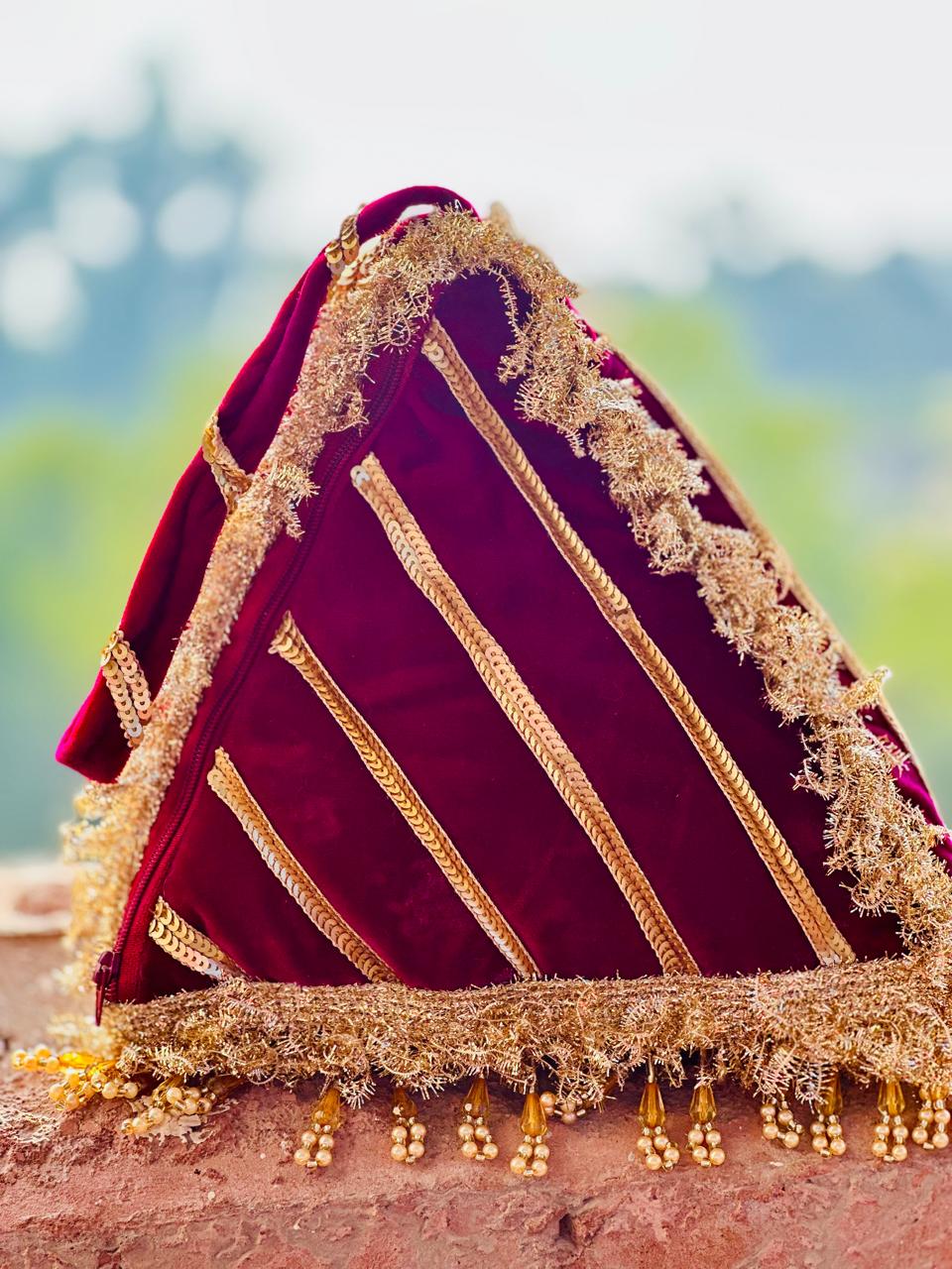 Naazli: Plum & Gold Triangular Velvet Bridal Potli