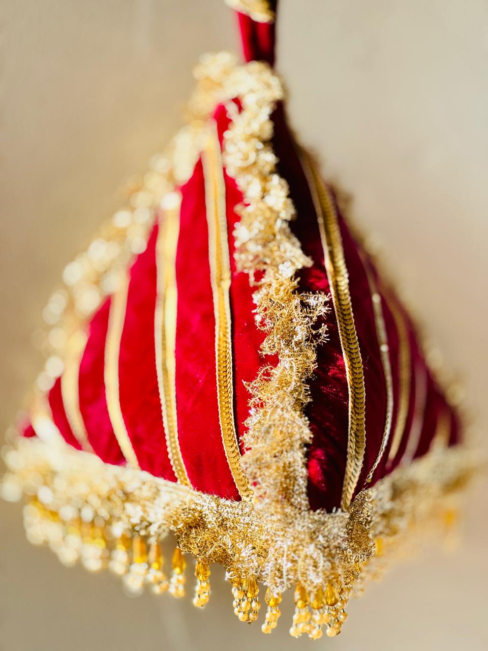 Naazli: Plum & Gold Triangular Velvet Bridal Potli