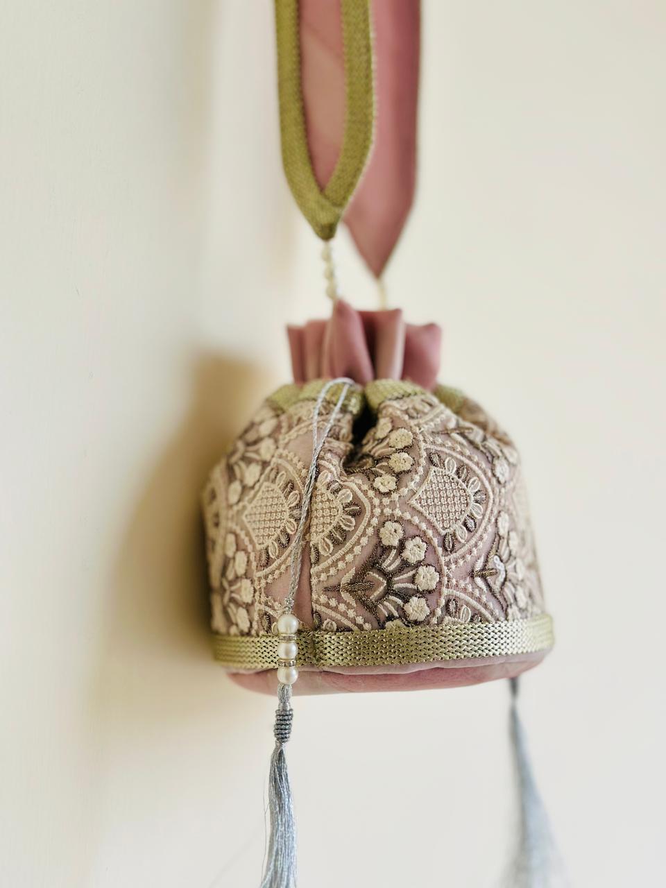 Nishaat: Blush Pink Lattice Embroidered Potli Bag