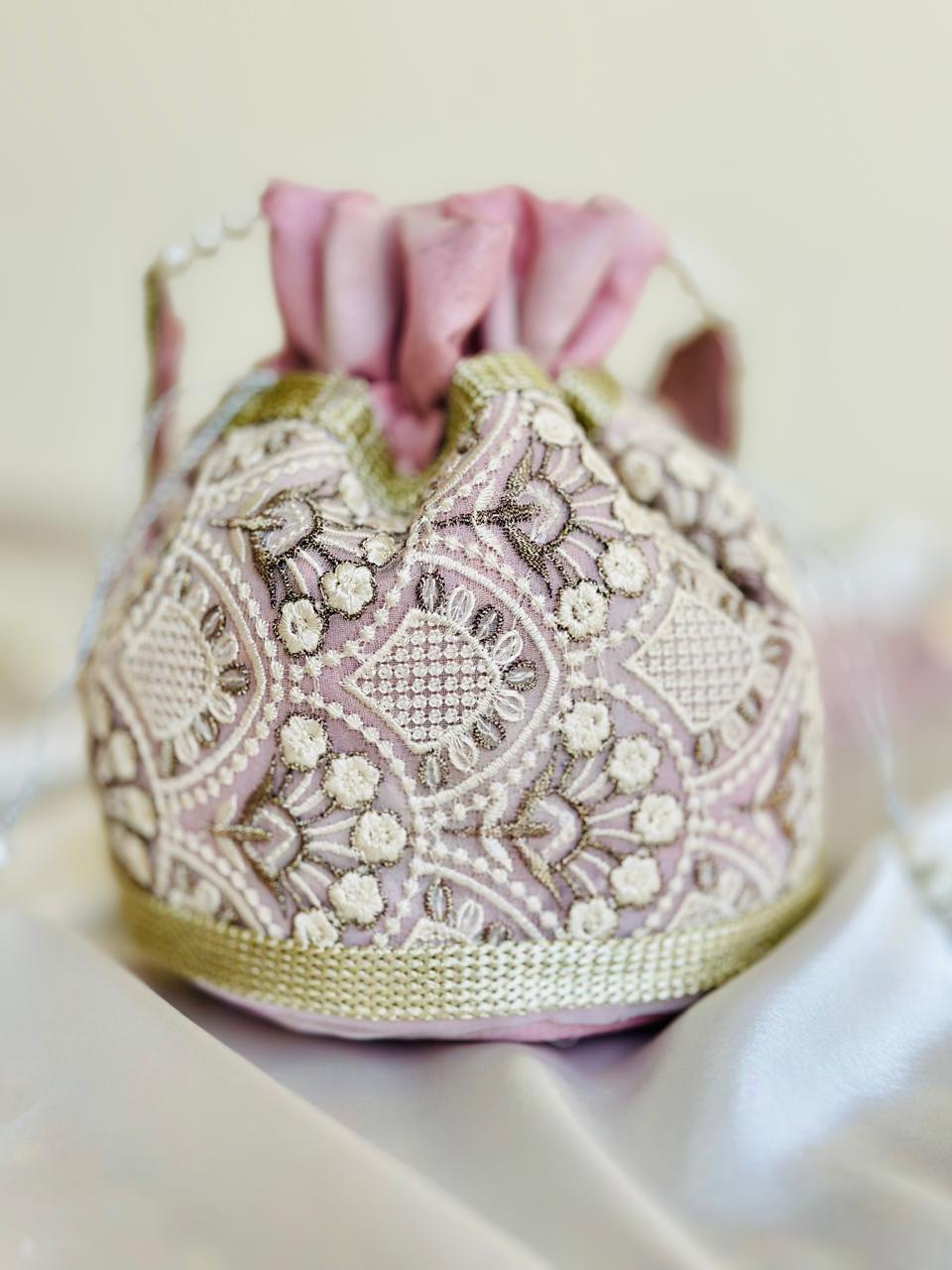 Nishaat: Blush Pink Lattice Embroidered Potli Bag