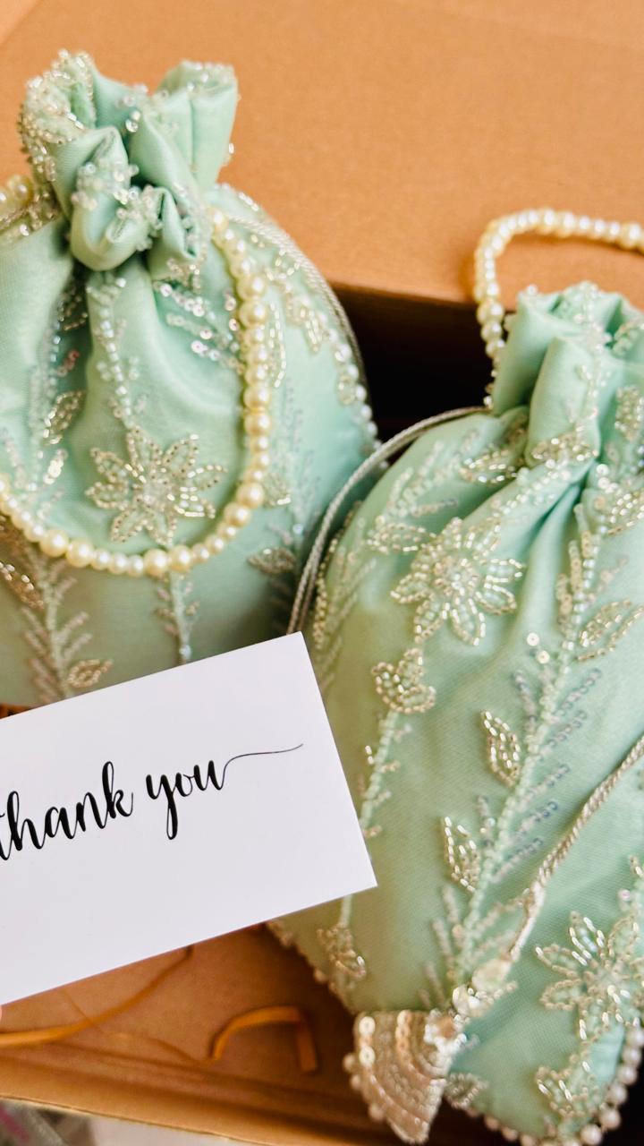 Zaiba: Mint Green Floral Beadwork Potli with Pearl Border