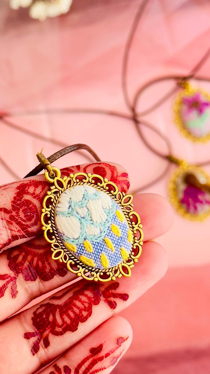 Hand Embroidered Raincloud Pendant – Vintage Style Miniature Textile Art Necklace – Blue & Gold