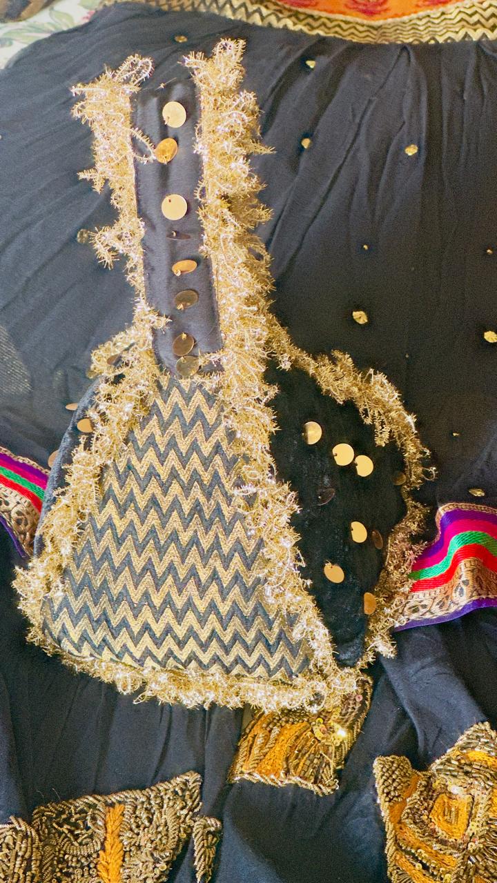 Surmai: Black & Gold Chevron Hand-Embellished Potli