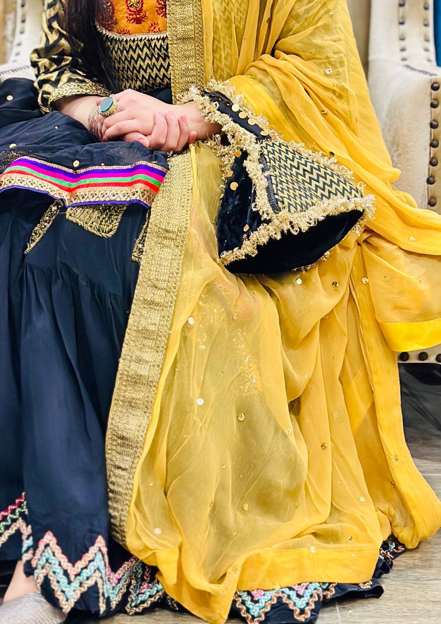 Surmai: Black & Gold Chevron Hand-Embellished Potli