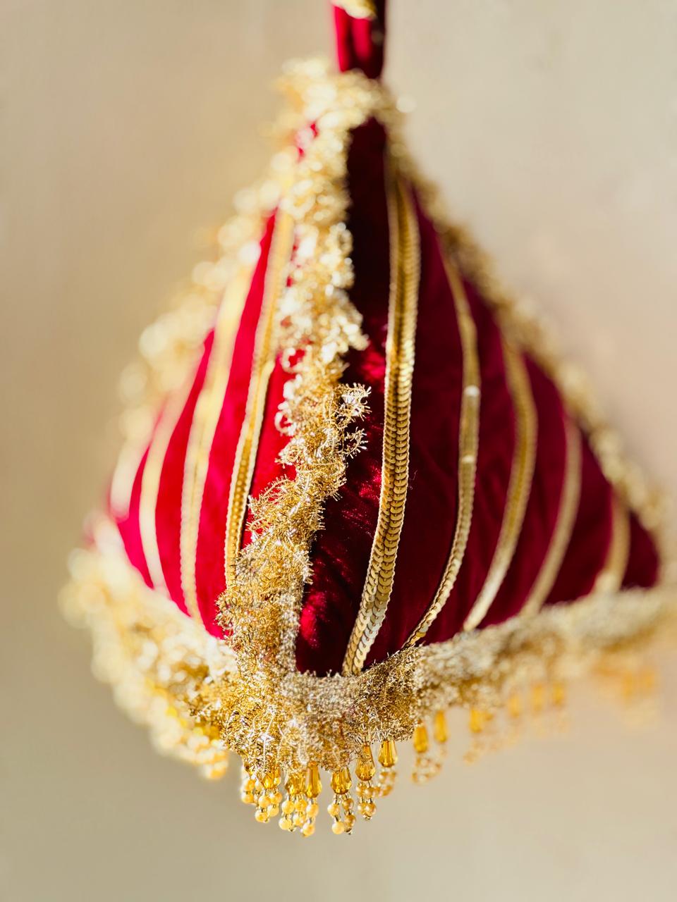 Naazli: Plum & Gold Triangular Velvet Bridal Potli