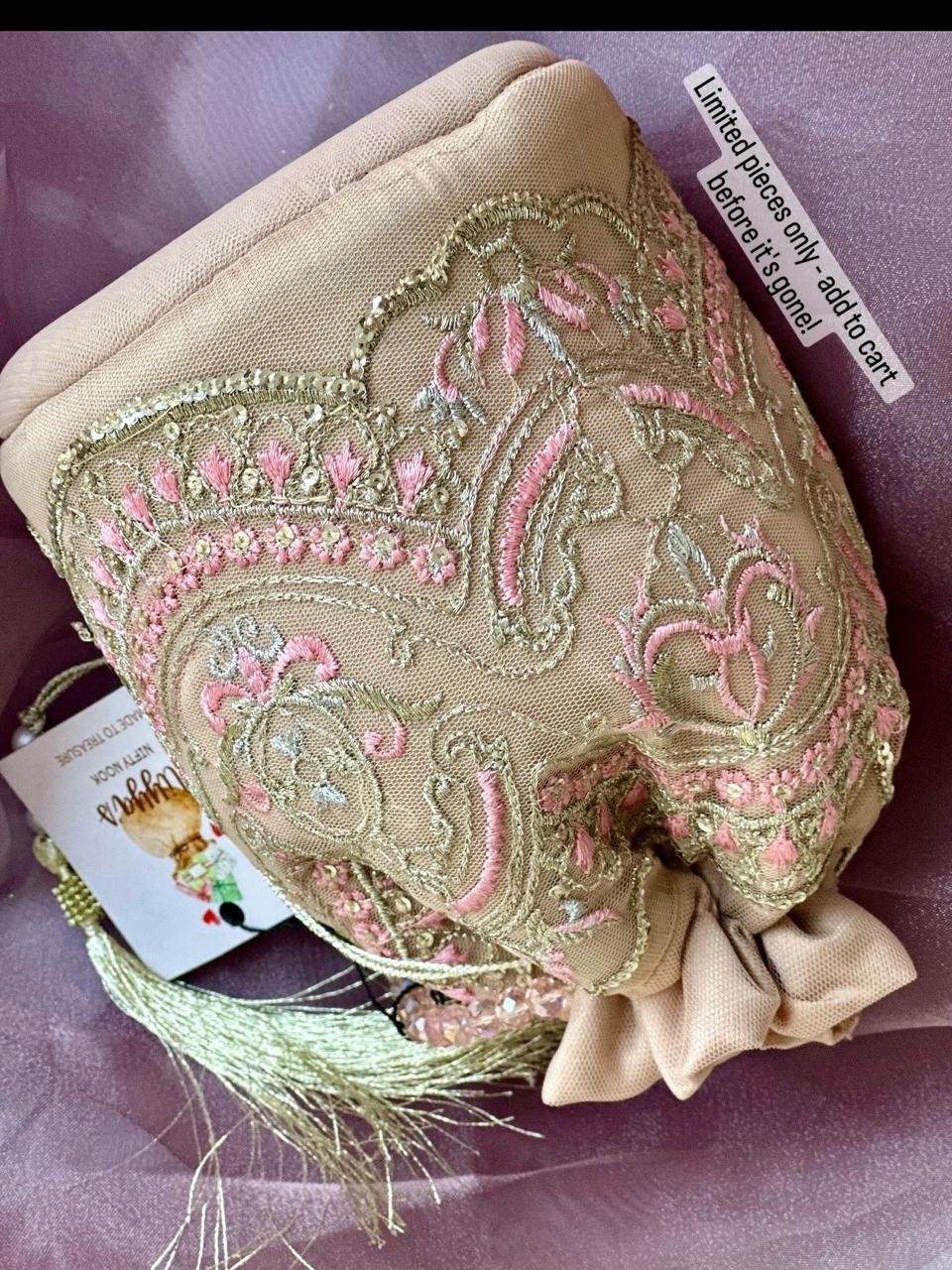 Zohra: Blush Beige Net Potli with Pink Embroidery