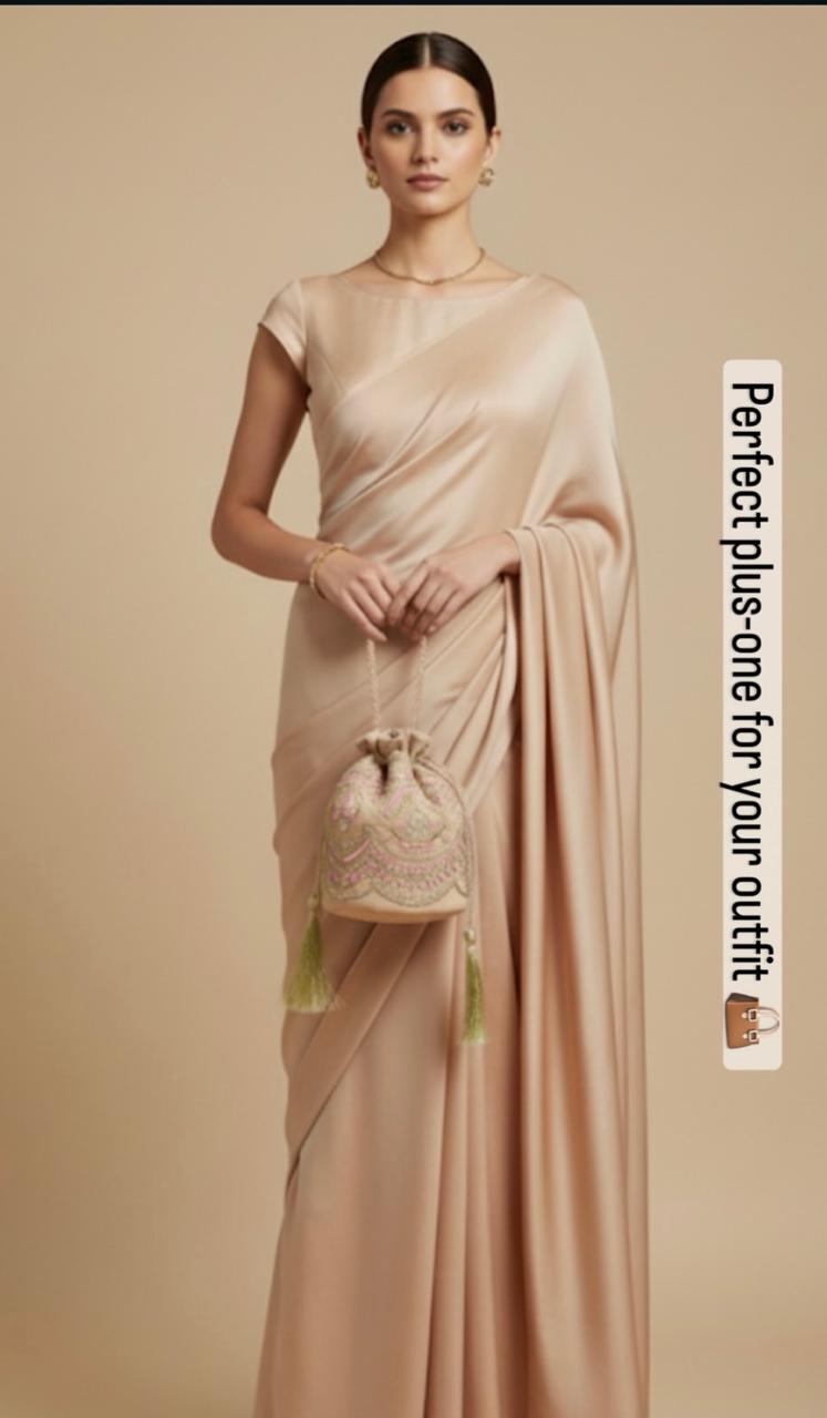Zohra: Blush Beige Net Potli with Pink Embroidery