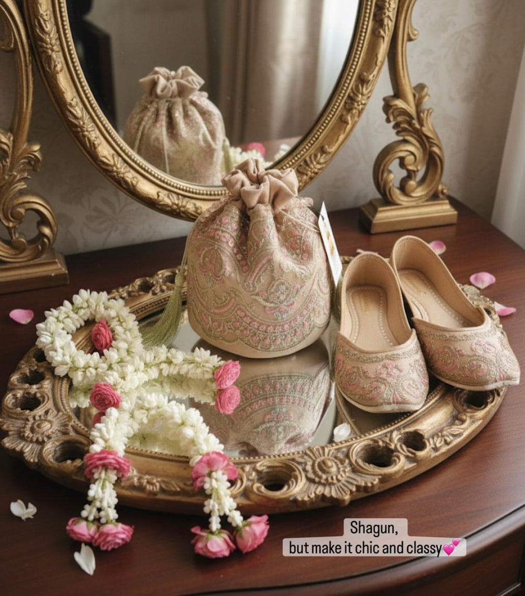 Zohra: Blush Beige Net Potli with Pink Embroidery