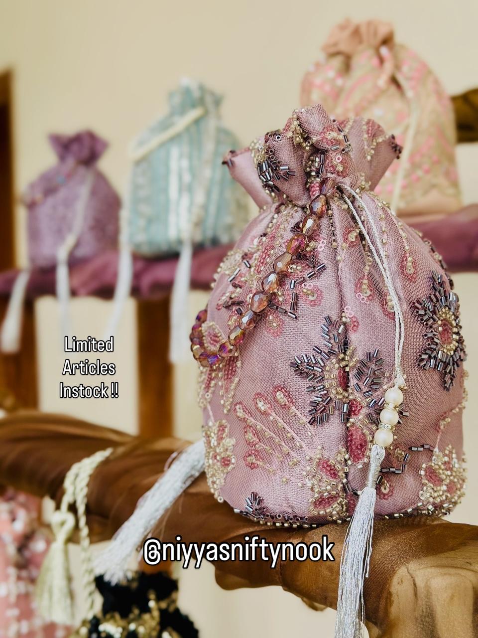Dur-e-Nayab: Radiant Rose & Pearl Hand-Embellished Potli