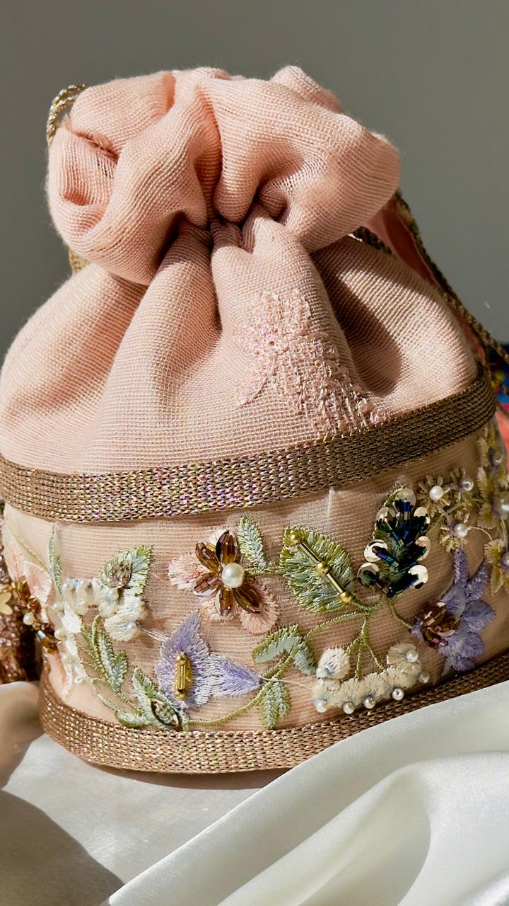 Hand-Embroidered Net Potli Bag with Floral Appliqué & Statement Tassels - Peach