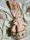 Hand-Embroidered Net Potli Bag with Floral Appliqué & Statement Tassels - Peach
