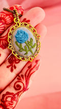 Hand-Embroidered Blue Rose Pendant - Vintage Gold Filigree Cameo Necklace - Artisan Hand-Stitched Jewelry