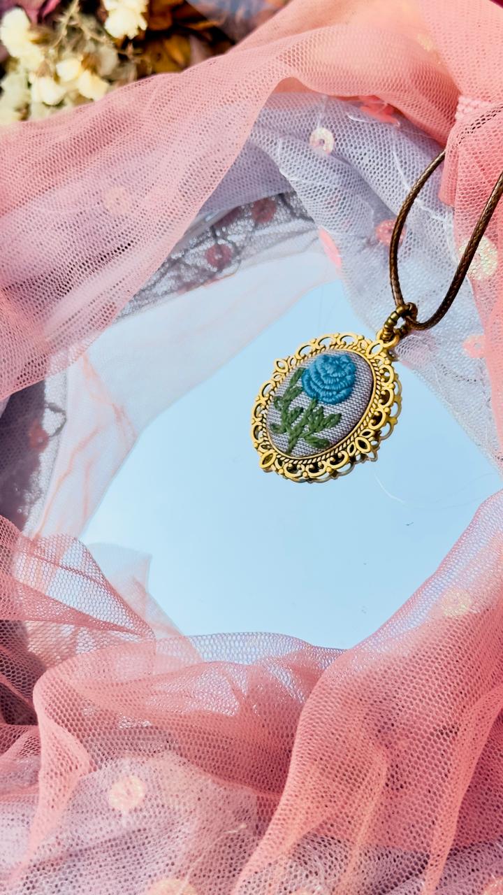 Hand-Embroidered Blue Rose Pendant - Vintage Gold Filigree Cameo Necklace - Artisan Hand-Stitched Jewelry