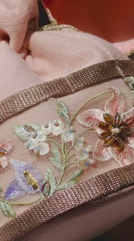 Mah-e-Zar: Pink Net Potli with Floral Appliqué & Tassels