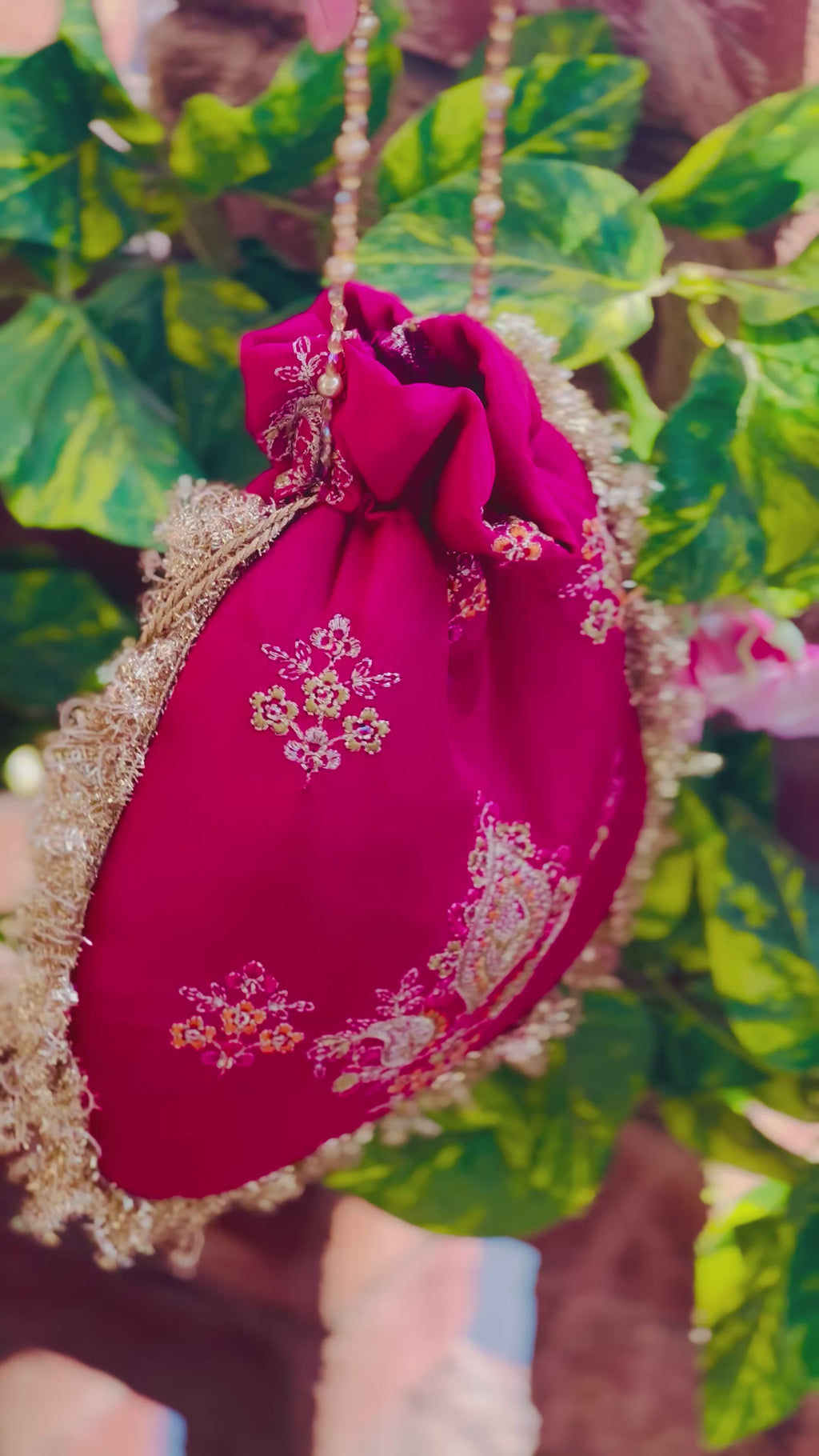 Rukhsaar: Hot Pink Silk Potli - Gold Motifs & Fringes