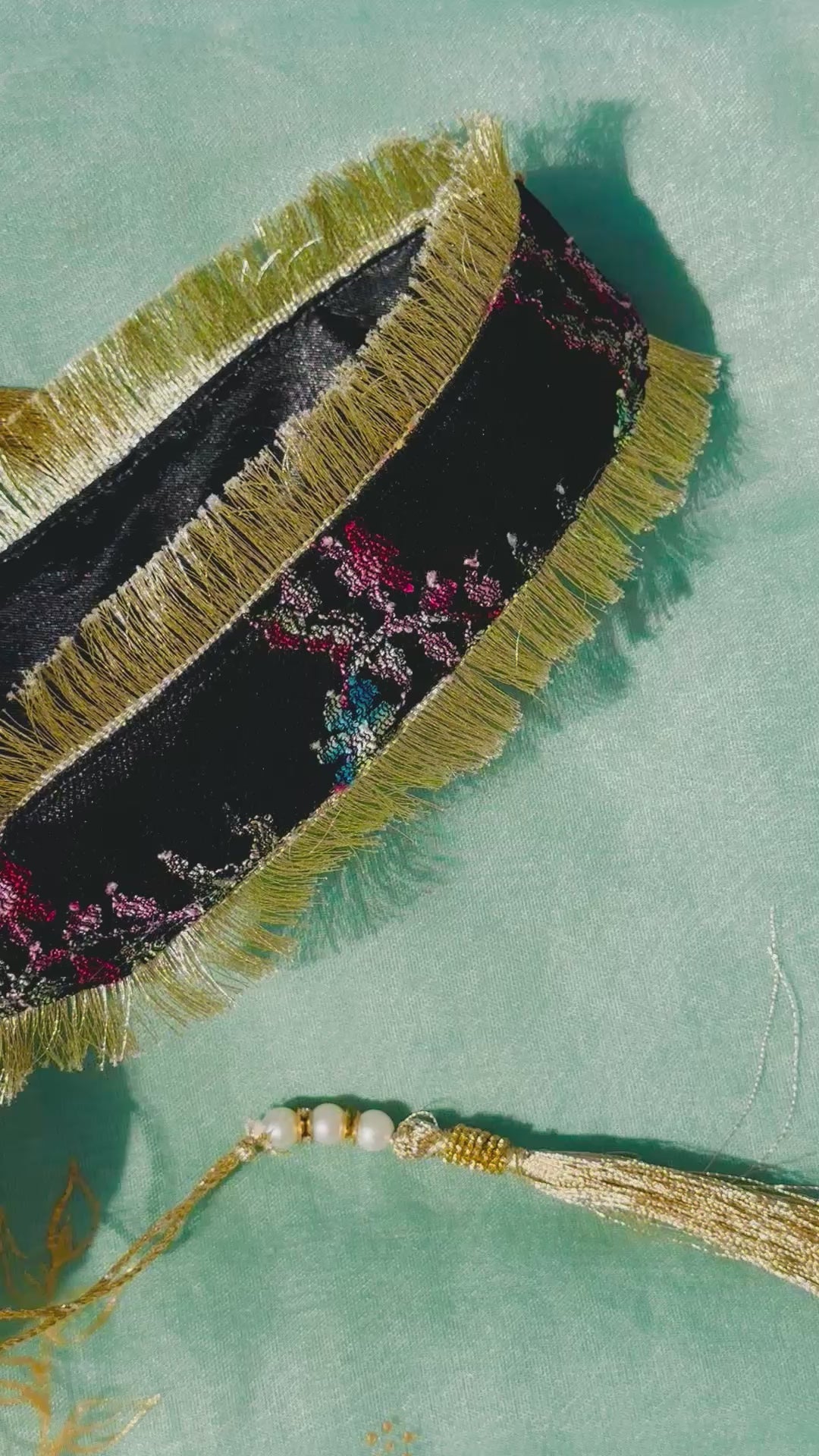 Sahar Handcrafted Floral Jacquard Potli Bag | Black & Gold Fringe Clutch