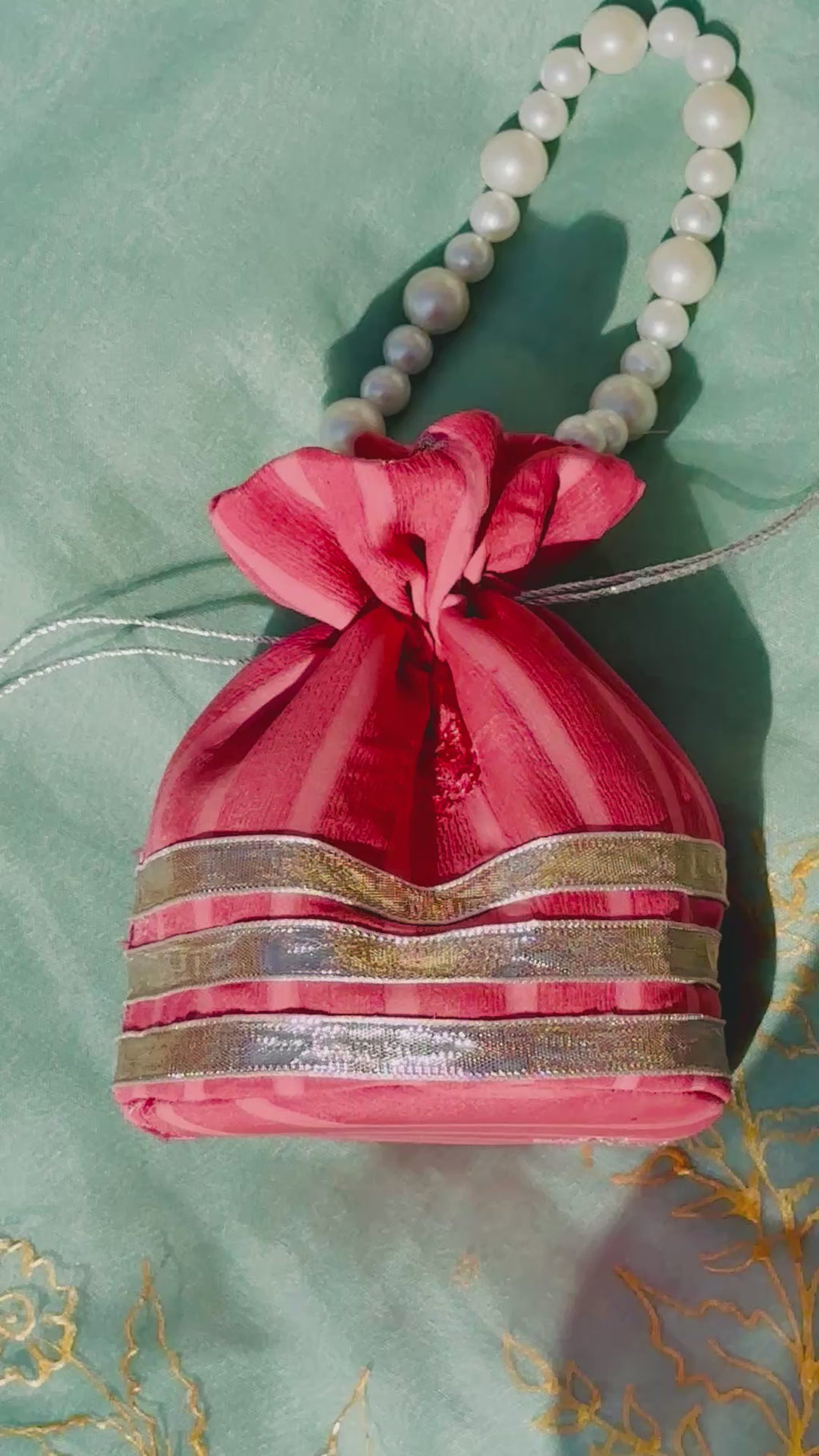 Handcrafted Coral Chiffon Potli Bag with Pearl Handle & Silver Gota Lace - Striped Festive Clutch