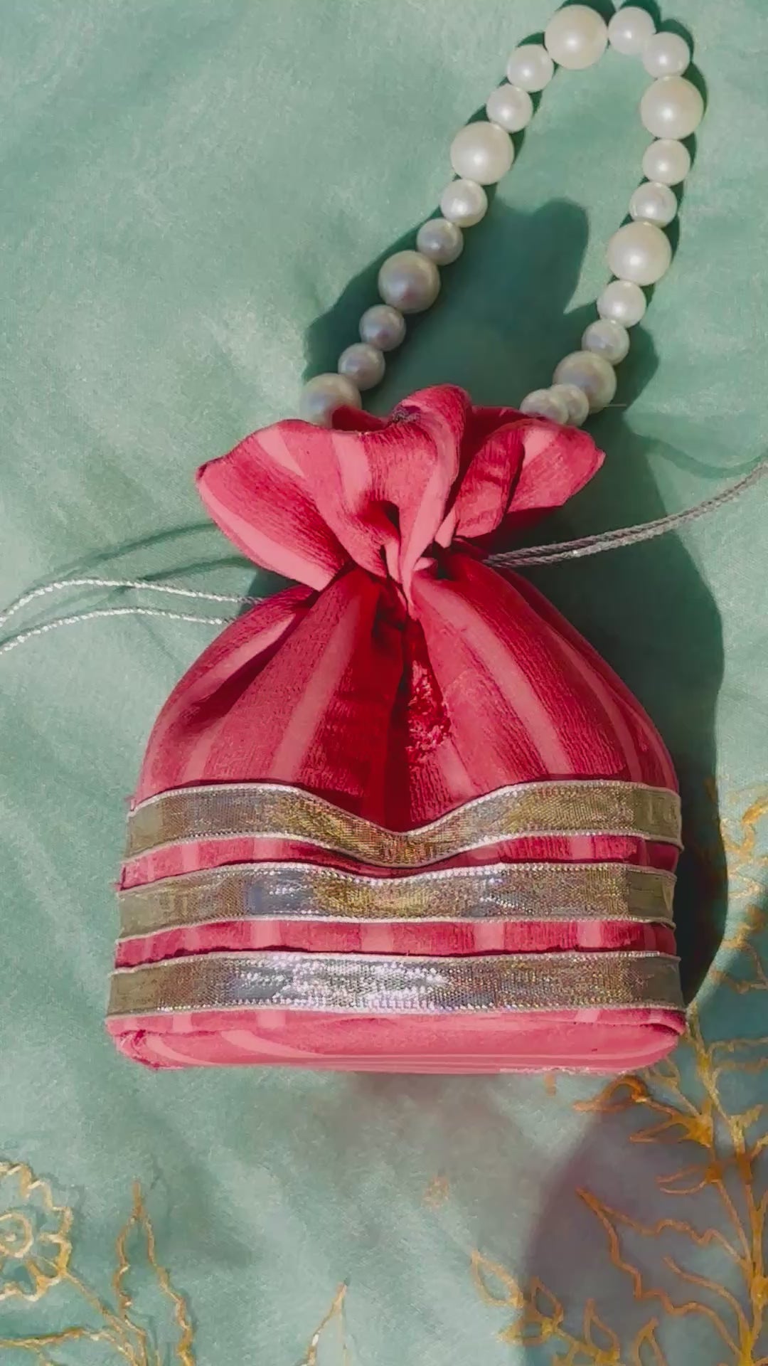 Handcrafted Coral Chiffon Potli Bag with Pearl Handle & Silver Gota Lace - Striped Festive Clutch