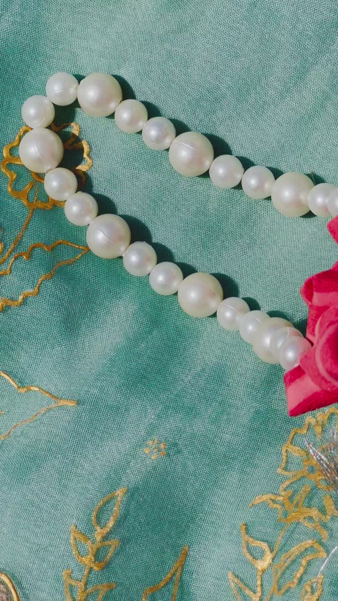 Bakhtawar: Coral Chiffon Potli with Pearl Handle & Silver Gota