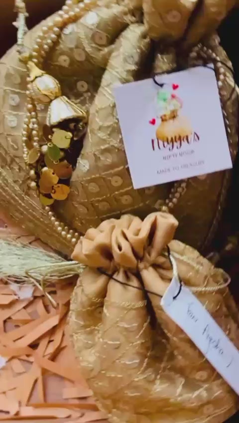 Zarnaab (زرناب): Golden Hand-Embellished Bridal Potli