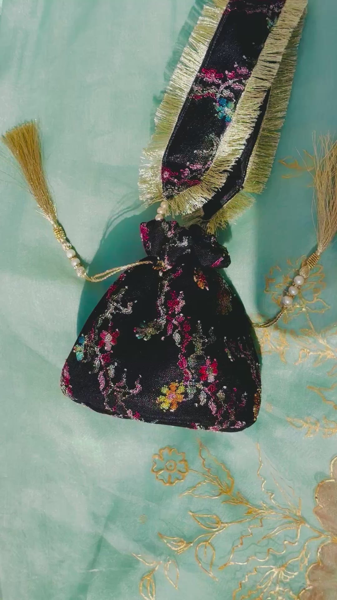 Sahar Handcrafted Floral Jacquard Potli Bag | Black & Gold Fringe Clutch